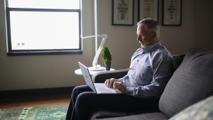 Older man on laptop